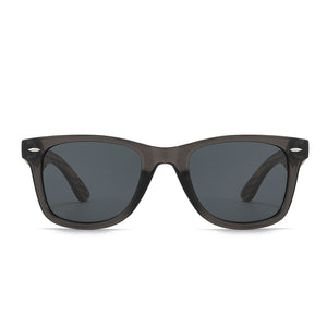 SOEK Black sunglasses with wooden arms on a white background
