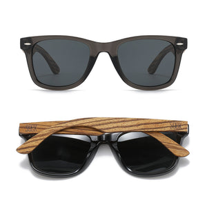 SOEK Black sunglasses with wooden arms on a white background